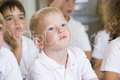 A schoolboy in a primary class