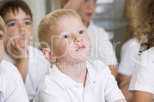 A schoolboy in a primary class