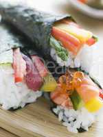 Three hand Rolled Seafood and Vegetable Sushi