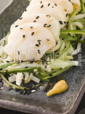 Sashimi of Dive Scallops Cucumber Mouli and sesame salad