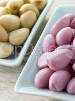 Dishes of Pickled Garlic