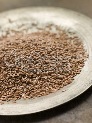 Brown Linseed on a Pewter Plate