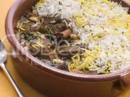 Pot of Lamb Biryani with a spoon