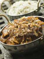 Dish of Dopiaza Veal with Fragrant Pilau Rice