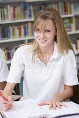 Student studying in library