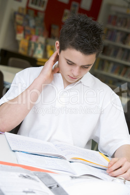 Student studying in library