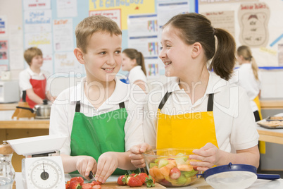 Schoolchildren at school in a cooking class