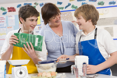 Schoolchildren and teacher at school in a cooking class