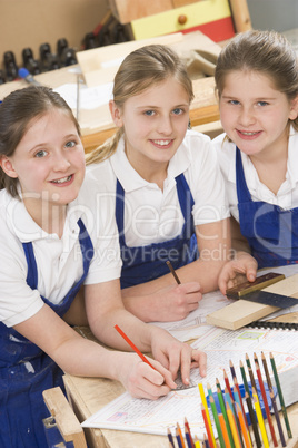 Schoolgirls in woodwork class