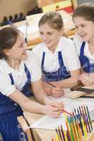 Schoolgirls in woodwork class