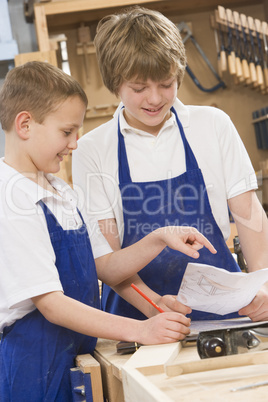 Schoolboys in woodwork class