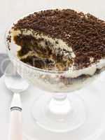 Individual Tiramisu with a spoon out