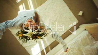 Girl dances with a wreath