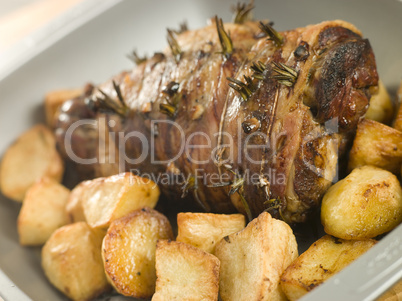 Roast Leg of Lamb Studded with Garlic and Rosemary and Roast Pot