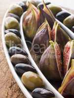 Dish of Green and Black Olives with Fresh Figs