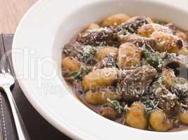 Oxtail Braised in Red Wine with Basil Gnocchi and Parmesan Chees