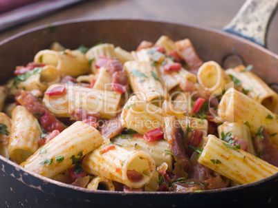 Pan of Rigatoni Pasta with Tomato and Pancetta Sauce