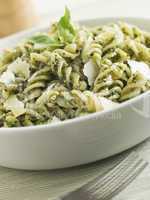 Bowl of Fusilli Pasta dressed in Pesto with Parmesan Shaves