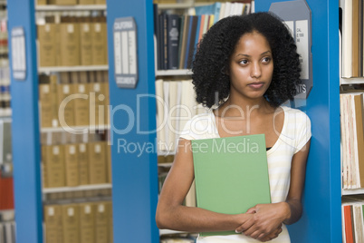 University student working in library