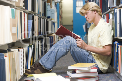 University student working in library