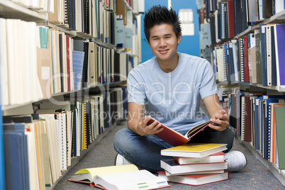 University student working in library