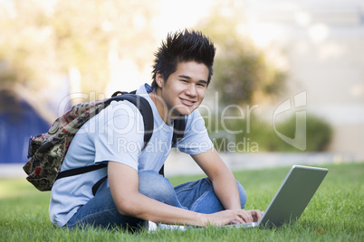 University student with laptop computer