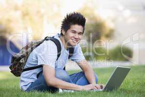 University student with laptop computer