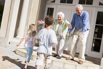 Grandparents welcoming grandchildren