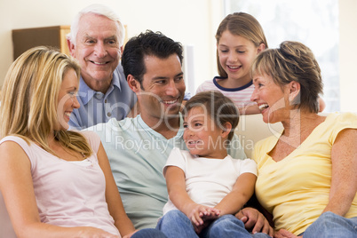 Extended family in living room smiling