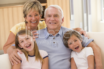 Grandparents posing with grandchildren