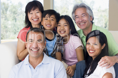 Extended family in living room smiling