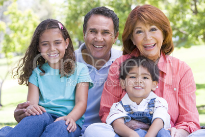 Grandparents posing with grandchildren