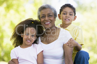 Grandmother posing with grandchildren