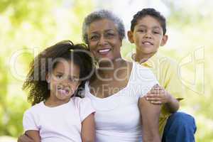 Grandmother posing with grandchildren