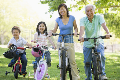 Grandparents bike riding with grandchildren