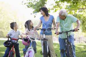 Grandparents bike riding with grandchildren