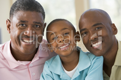 Grandfather with adult son and grandchild