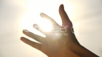 The sun's rays through your fingers