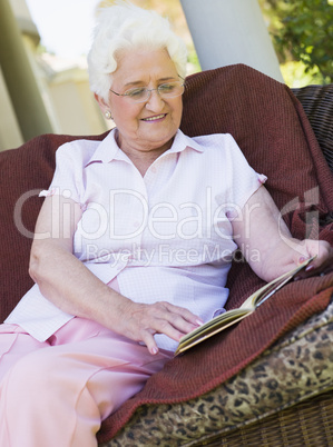 Senior woman reading book