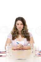 Businesswoman sitting in boardroom