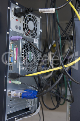 Shot of many cables in the back of a computer modem