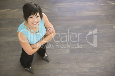 Businesswoman standing indoors smiling