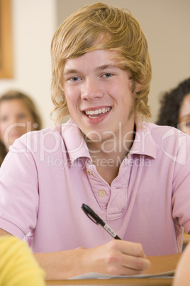 Male college student in a university lecture hall