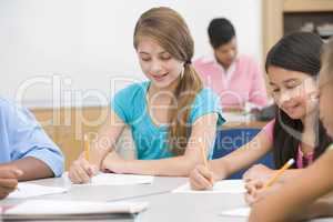 Elementary school pupils in classroom