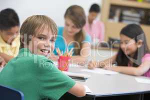 Elementary school pupil at desk