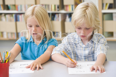 Kindergarten children learning to write