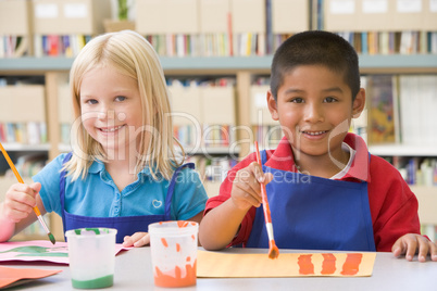 Kindergarten children painting