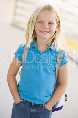 Portrait of kindergarten girl with backpack