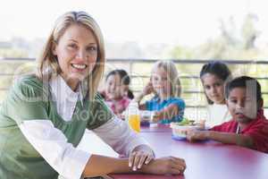 Kindergarten children eating lunch