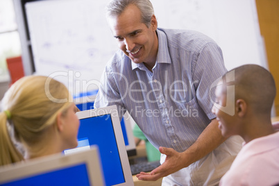 IT teacher demonstrating in class